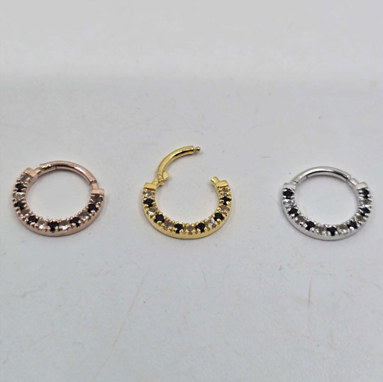 “Parvati” 14k Septum or daith clicker with Oregon Sunstone and black spinel