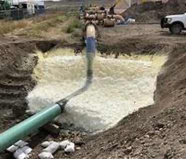 PHOTO #5 PHOTO PIPELINE STABILIZAITON FOAM on HILLSIDE